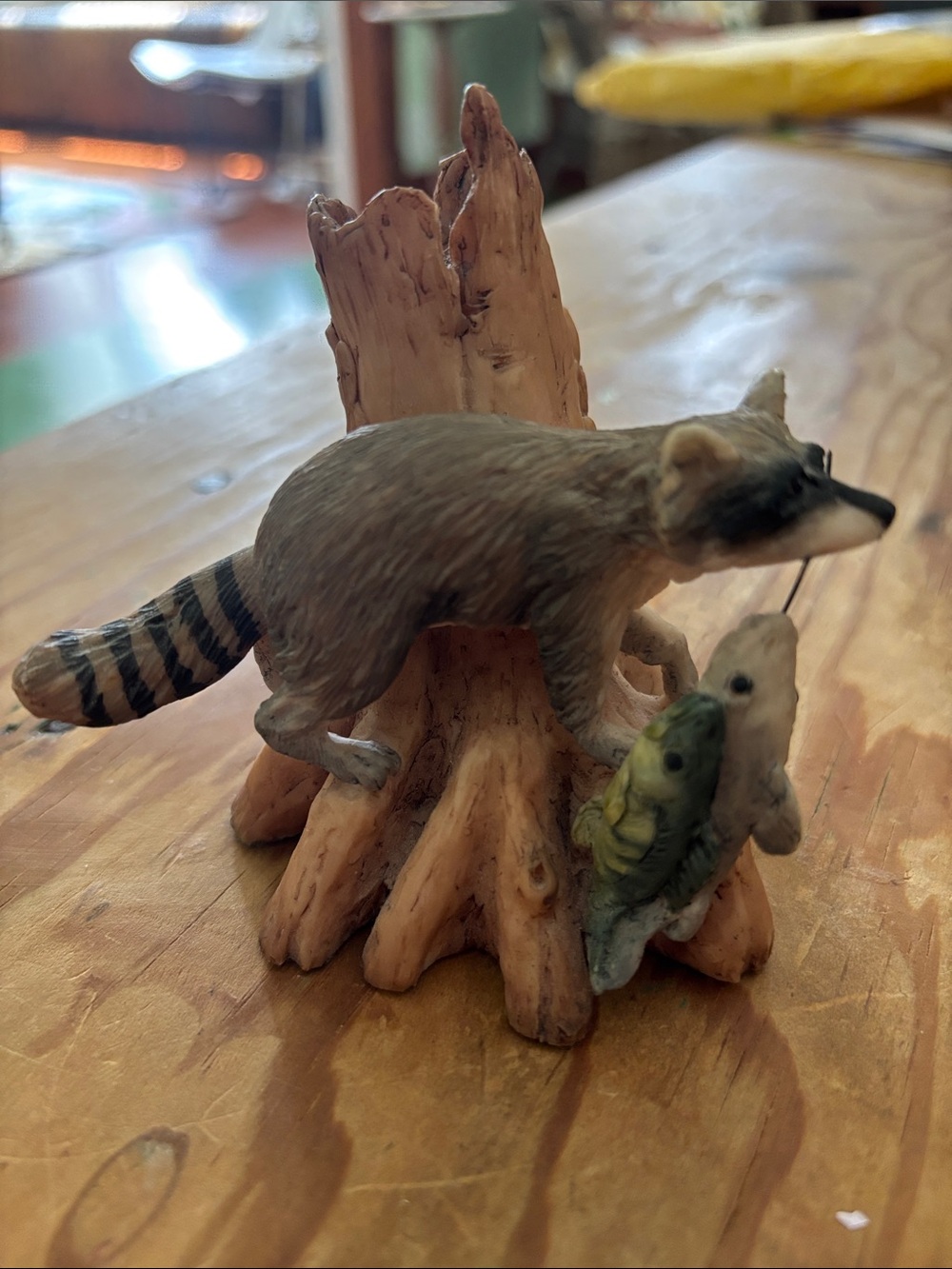 Lowell Davis Raccoon Figurine on Tree Stump with Fish